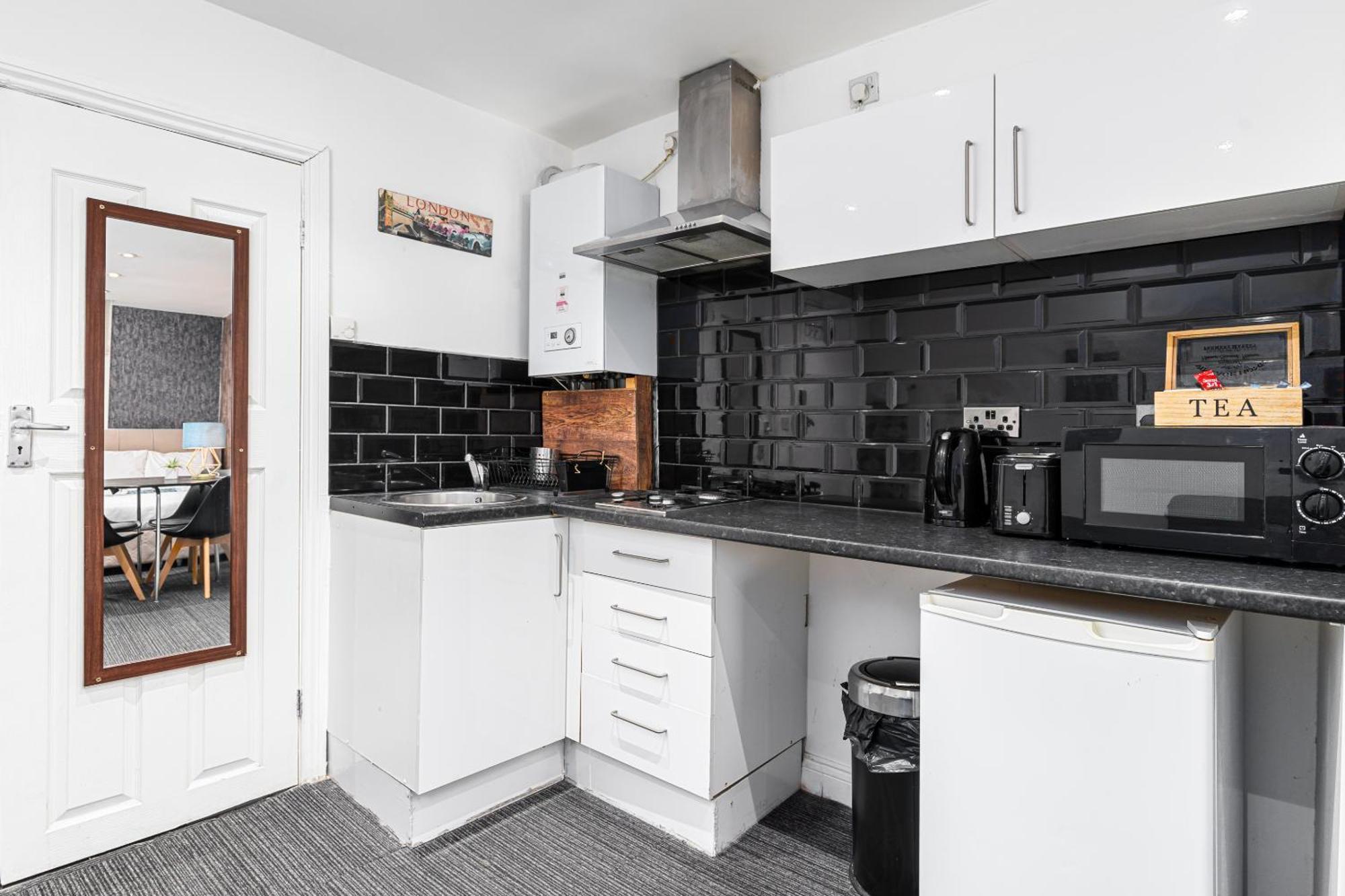 Whitechapel Grand Apartman London Szoba fotó