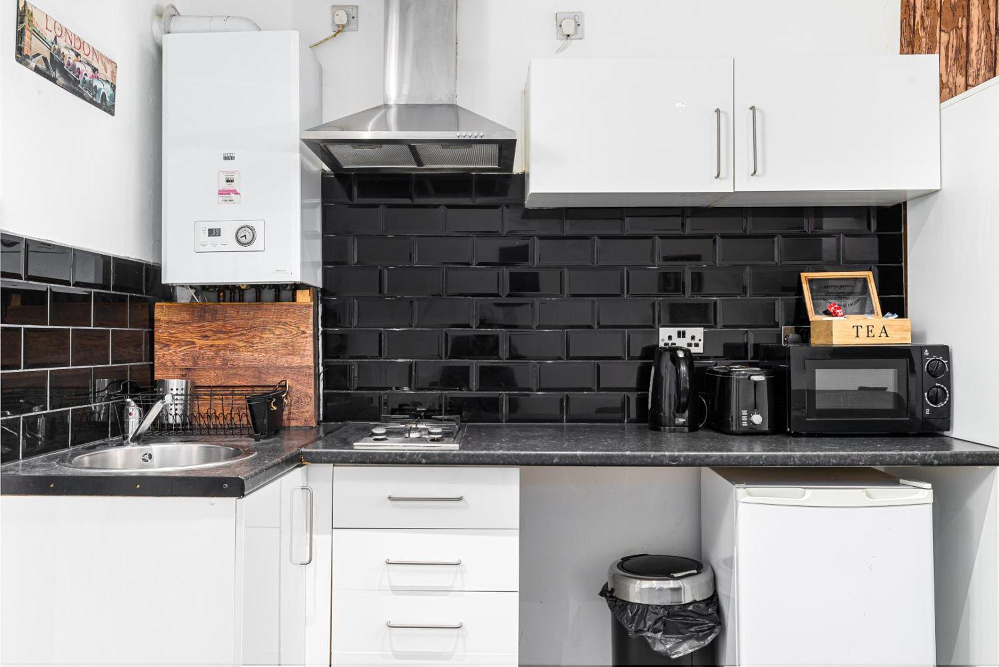 Whitechapel Grand Apartman London Szoba fotó
