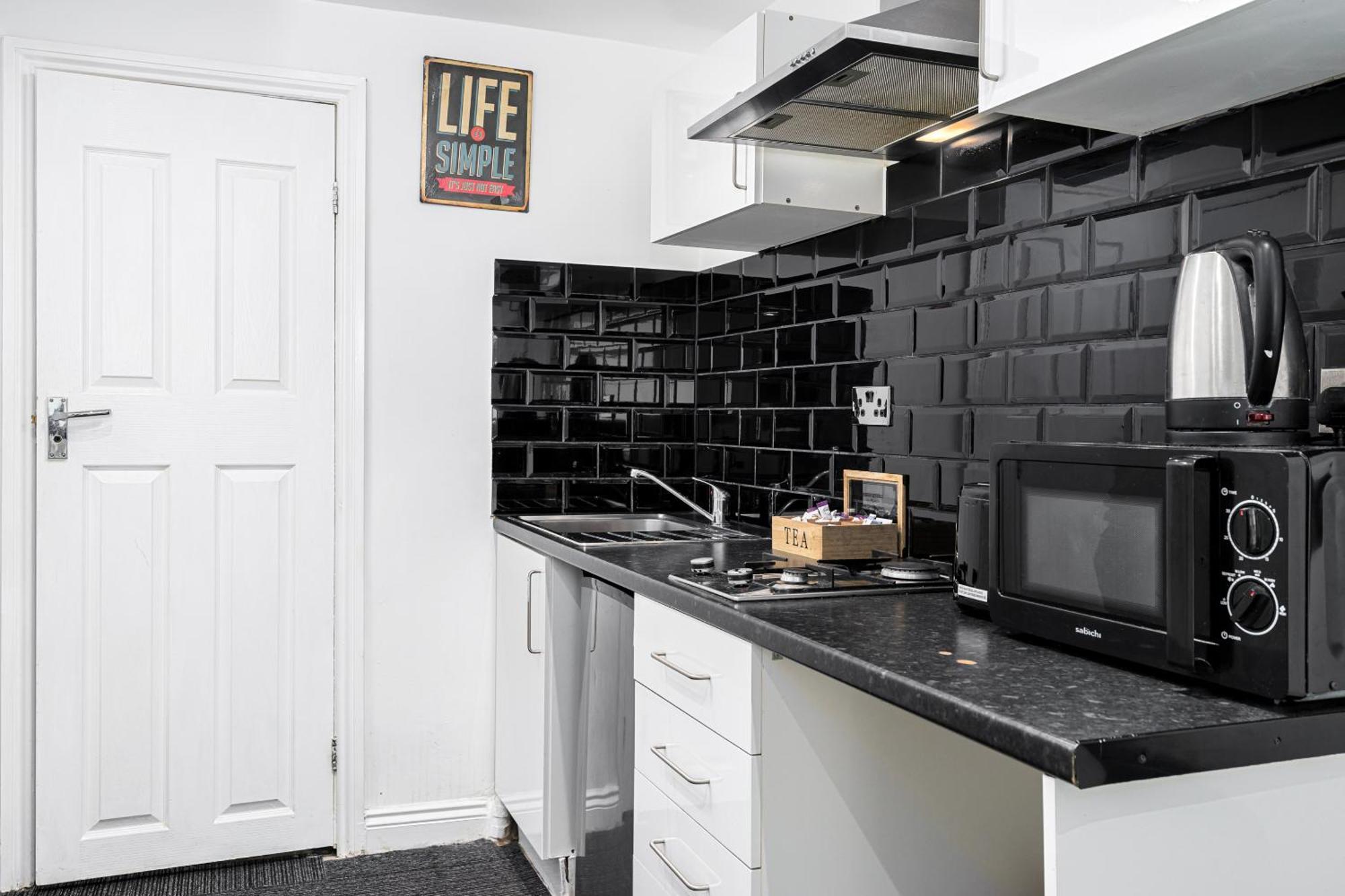 Whitechapel Grand Apartman London Szoba fotó